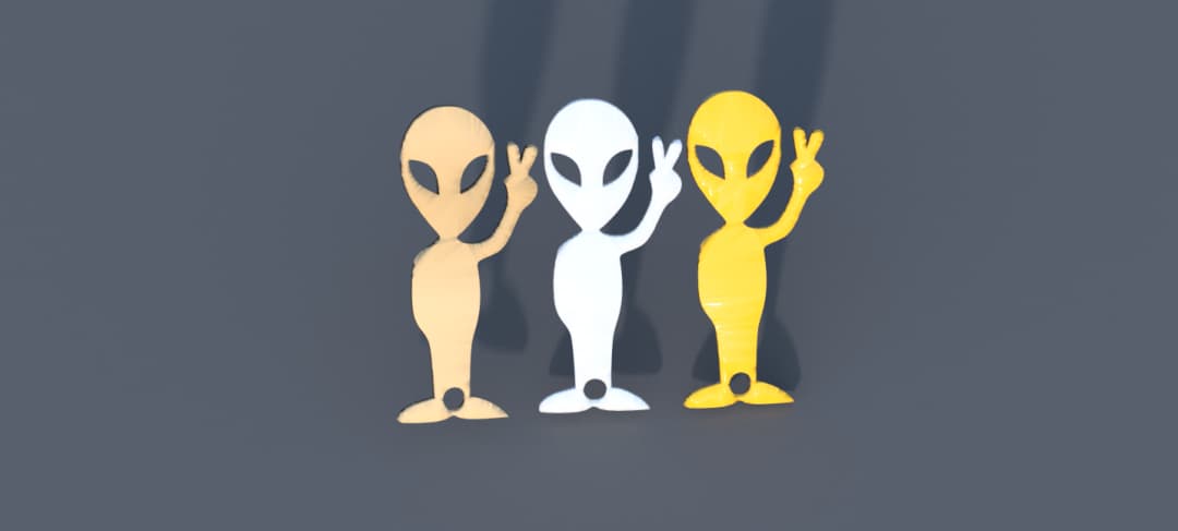 This is a keychain with an alien shape